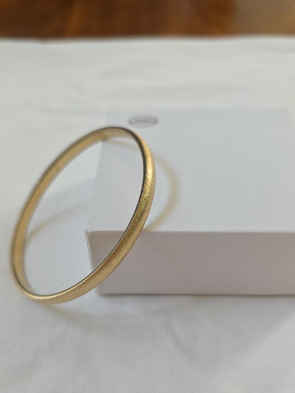 Monet Vintage Gold-Tone Textured Bangle Minimalist Bracelet Circa 1970s/1980s